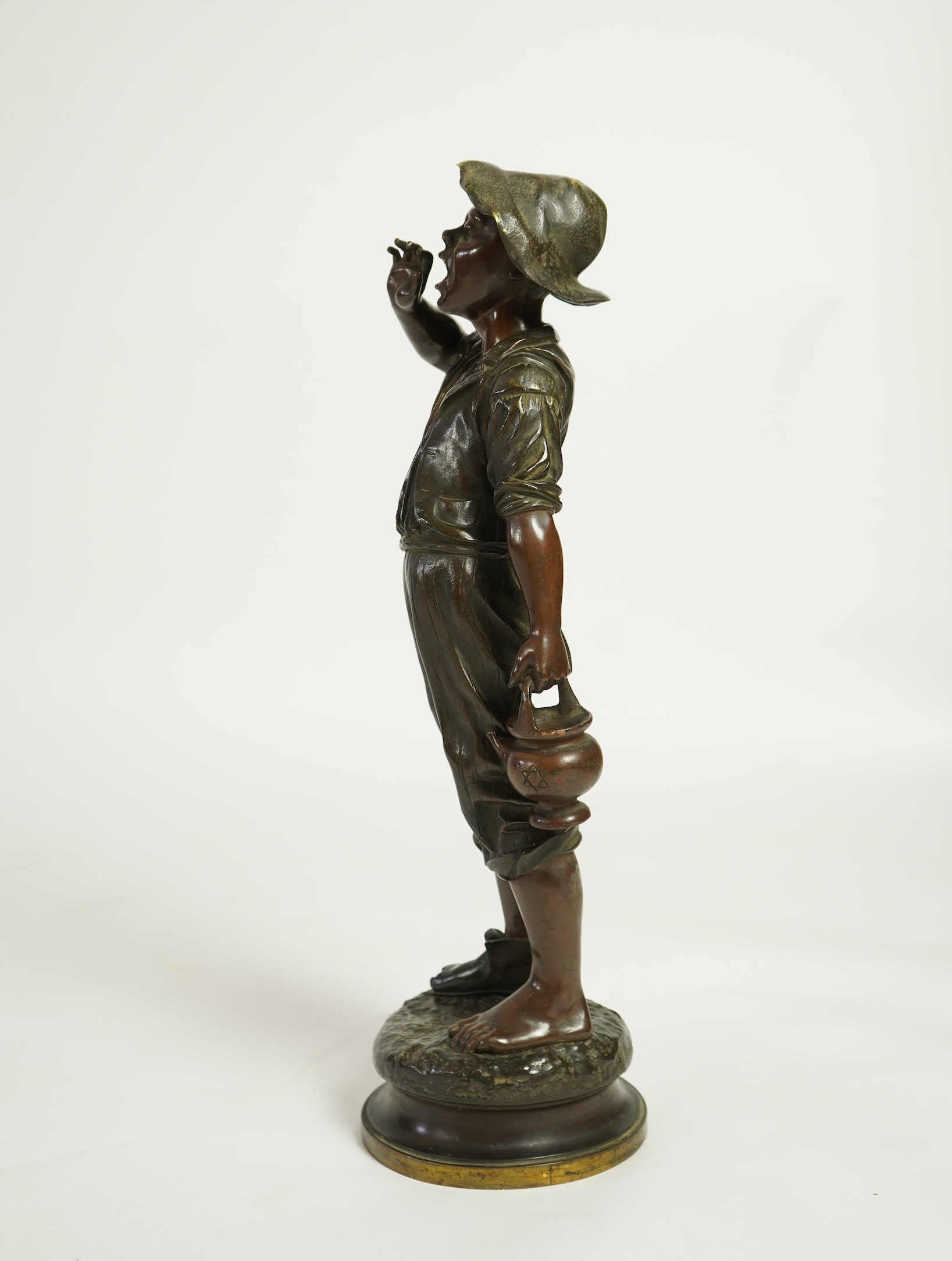 Paul Dubois (French 1829-1905), 'Le petit porteur d'eau' a patinated bronze figure, c.1900